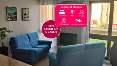 Coin salon dans l'établissement Appartement 4 chambres Idéal 24h moto & voiture