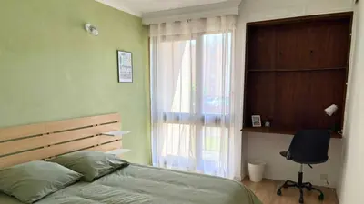 Un ou plusieurs lits dans un hébergement de l'établissement Appartement 4 chambres Idéal 24h moto & voiture