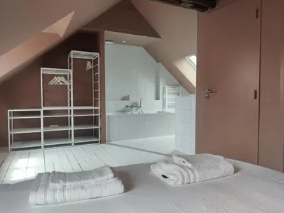 Un ou plusieurs lits dans un hébergement de l'établissement La Maison Royale - Calme en Plein Centre d'Amboise