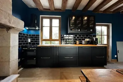 Cuisine ou kitchenette dans l'établissement Longère du Gué du Roi & SPA