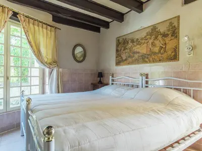 Un ou plusieurs lits dans un hébergement de l'établissement Riverside Hideaway in Cinais