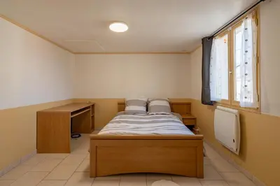 Un ou plusieurs lits dans un hébergement de l'établissement Maison Zen - 20 min du centre du Mans