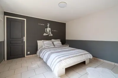 Un ou plusieurs lits dans un hébergement de l'établissement Maison Zen - 20 min du centre du Mans