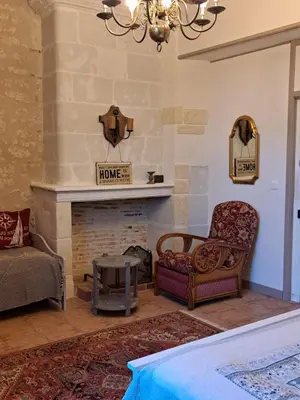 Coin salon dans l'établissement Chambres d'Hôtes L'Ecu