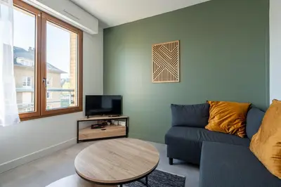 Télévision ou salle de divertissement dans l'établissement Le Rivage - Wifi - Centre-ville