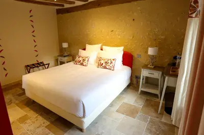 Un ou plusieurs lits dans un hébergement de l'établissement Chambre Saumur