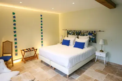 Un ou plusieurs lits dans un hébergement de l'établissement Chambre Saumur