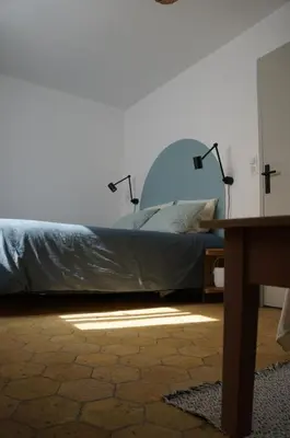 Un ou plusieurs lits dans un hébergement de l'établissement Chambre du Grand Moulin
