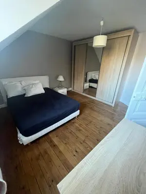 Un ou plusieurs lits dans un hébergement de l'établissement Maison 5mn du centre ville du Mans à pied