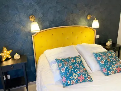 Un ou plusieurs lits dans un hébergement de l'établissement Charmant gîte à Langeais avec terrasse et wifi inclus pour 4 personnes - FR-1-381-616