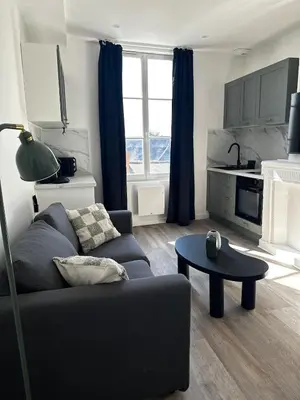 Télévision ou salle de divertissement dans l'établissement Les Oliviers - Centre ville de Saumur