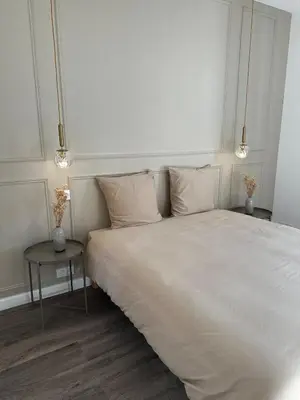 Un ou plusieurs lits dans un hébergement de l'établissement Les Jasmins - Centre Ville de Saumur