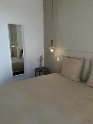 Un ou plusieurs lits dans un hébergement de l'établissement Les Jasmins - Centre Ville de Saumur