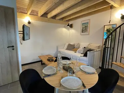 Coin salon dans l'établissement Gite le magnolia