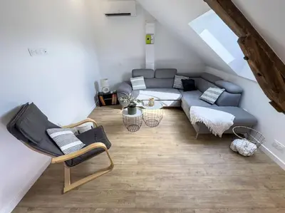 Coin salon dans l'établissement Le Logis de Trèfle