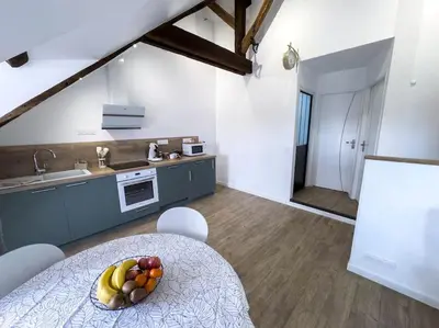 Cuisine ou kitchenette dans l'établissement Le Logis de Trèfle