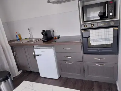 Cuisine ou kitchenette dans l'établissement L olivier