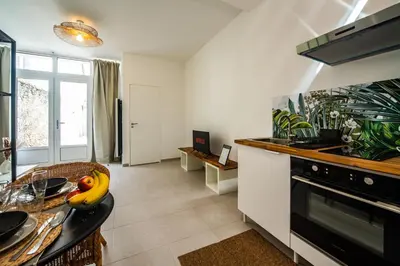 Cuisine ou kitchenette dans l'établissement L'Éden Caché - Terrasse - Parking