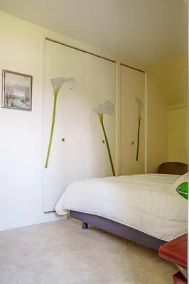 Un ou plusieurs lits dans un hébergement de l'établissement Maison 15 p avec piscine sud Touraine