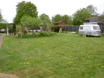 Jardin de l'établissement Chez Didier Emplacements tentes et Camping cars
