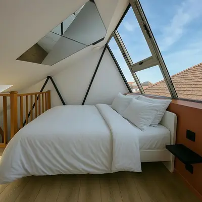 Un ou plusieurs lits dans un hébergement de l'établissement Loft avec Jaccuzi