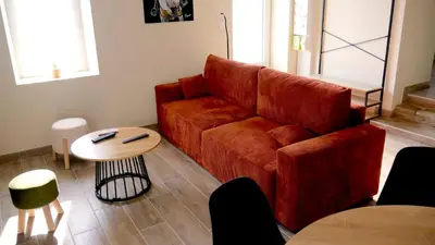Coin salon dans l'établissement Maison des Hirondelles