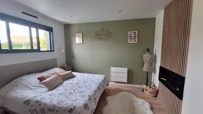 Un ou plusieurs lits dans un hébergement de l'établissement Chambre près du circuit du Mans