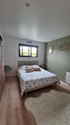 Un ou plusieurs lits dans un hébergement de l'établissement Chambre près du circuit du Mans