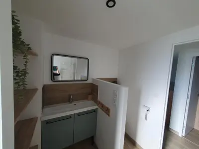 Cuisine ou kitchenette dans l'établissement Logement indépendant proche circuit 24h Le Mans