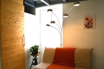 Coin salon dans l'établissement Le petit coin caché