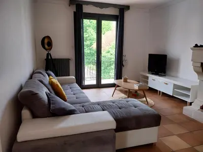 Télévision ou salle de divertissement dans l'établissement Belle maison proche du futuroscope