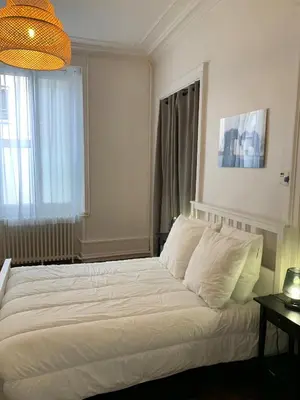 Un ou plusieurs lits dans un hébergement de l'établissement Appartement #2 cœur de ville
