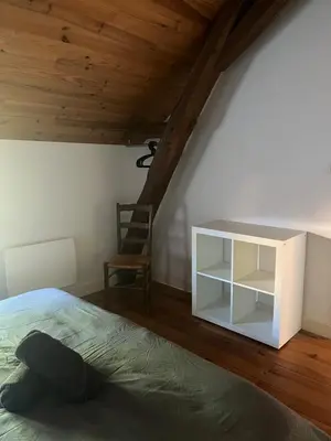 Un ou plusieurs lits dans un hébergement de l'établissement Maison de campagne Luzé
