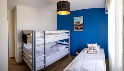 Un ou plusieurs lits dans un hébergement de l'établissement Gîte la Seigneurie -Piscine & SPA