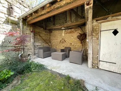 Jardin de l'établissement gîte des martinets and its corner of greenery