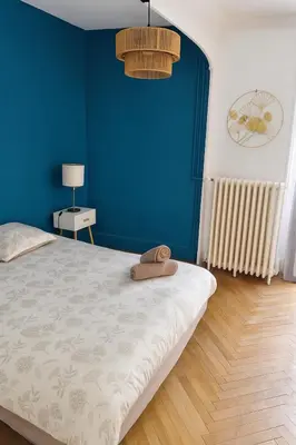 Un ou plusieurs lits dans un hébergement de l'établissement Maison cosy centre-ville 5 chambres