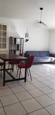 Coin salon dans l'établissement Grand appartement à Thouars