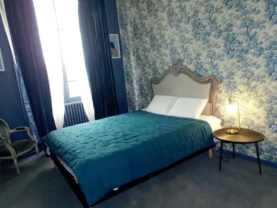 Un ou plusieurs lits dans un hébergement de l'établissement Palais abbatial de Bourgueil