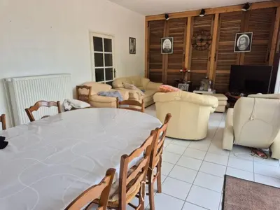 Coin salon dans l'établissement L'Opale - Chez L'habitant