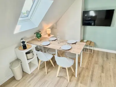 Télévision ou salle de divertissement dans l'établissement Cocon Caféiné