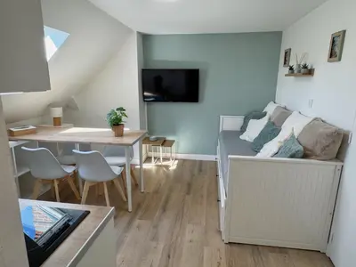 Télévision ou salle de divertissement dans l'établissement Cocon Caféiné