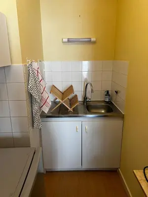 Cuisine ou kitchenette dans l'établissement Appartement au coeur de Saumur - Chambre climatisée