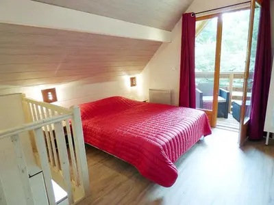 Un ou plusieurs lits dans un hébergement de l'établissement La Rossignolerie - Gîte des châteaux