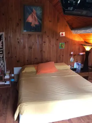 Un ou plusieurs lits dans un hébergement de l'établissement Maison atypique 3 chambres