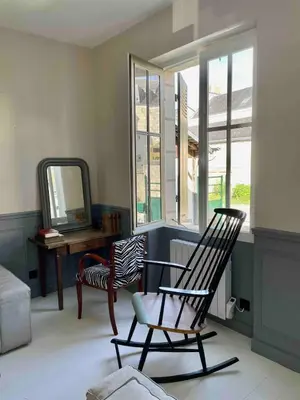 Coin salon dans l'établissement Charmante maison jardin centre