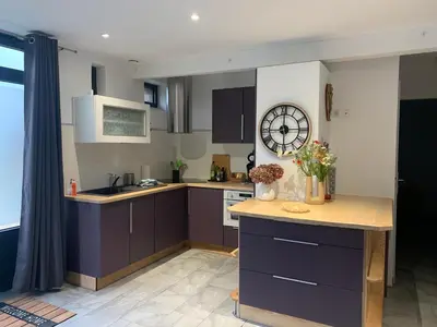 Cuisine ou kitchenette dans l'établissement Gîte la prairie