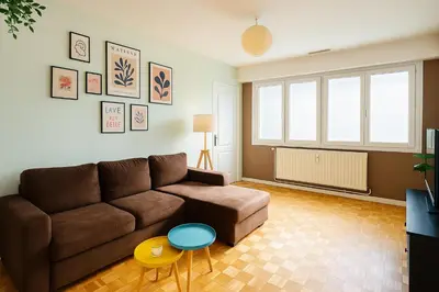 Coin salon dans l'établissement Appartement hyper centre avec Garage privé