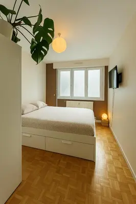 Un ou plusieurs lits dans un hébergement de l'établissement Appartement hyper centre avec Garage privé