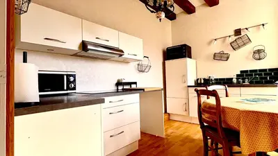 Cuisine ou kitchenette dans l'établissement Gite des Deux couronnes