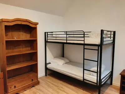 Un ou plusieurs lits dans un hébergement de l'établissement Gîte de campagne 4 ou 5 personnes